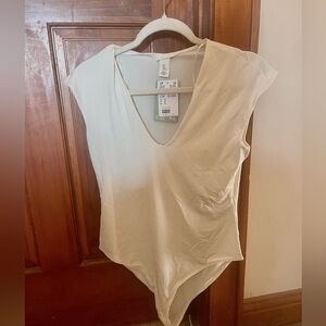 H&M cream bodysuit never worn new with tags